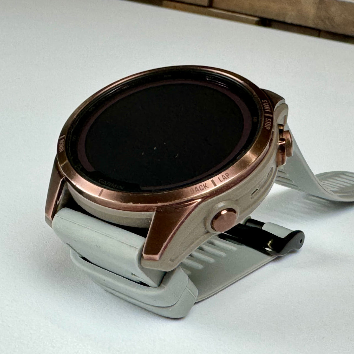 Garmin fēnix® 7S Sapphire Solar (42mm, Dark Bronze Titanium with Light Gray Band) - Pre Owned / 3 Month Warranty - Mac Shack
