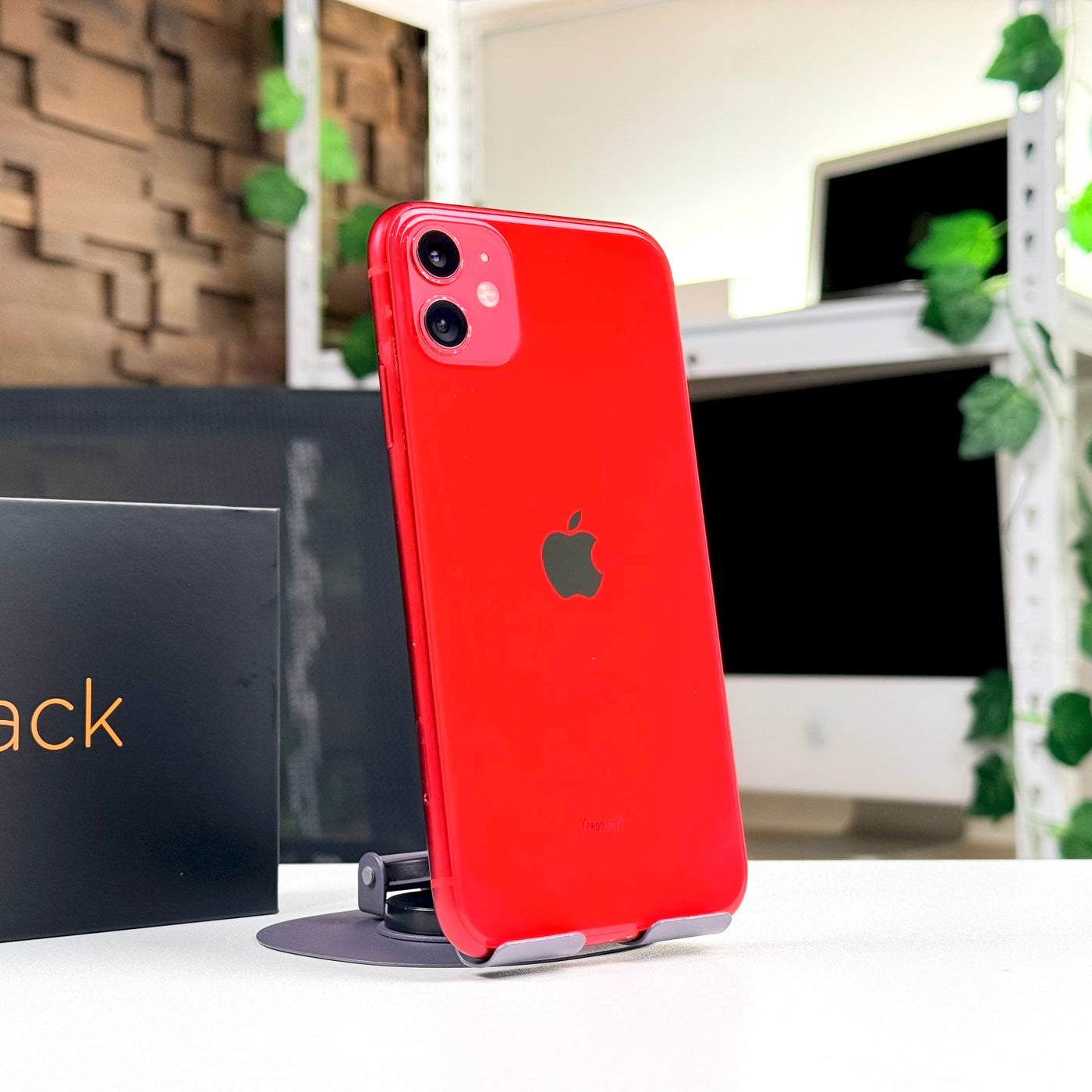 Pre-owned iPhone 11 128GB Red standing upright, rear view - Mac Shack