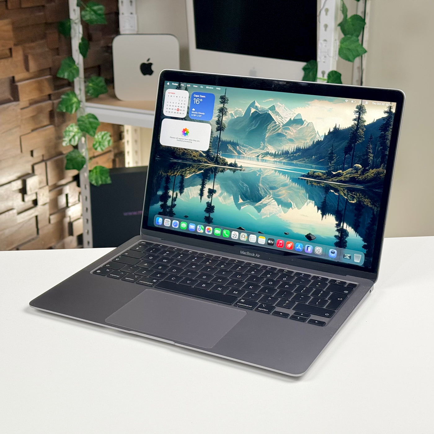 Angled view of the pre-owned MacBook Air M1 in Space Gray, open with the screen on - Mac Shack