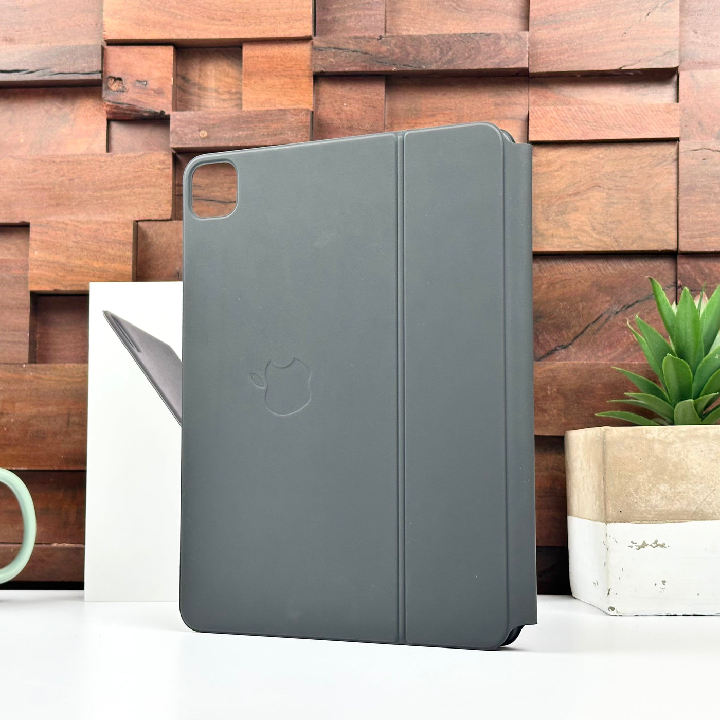 Pre-owned black Apple Magic Keyboard for iPad Pro 11-inch and iPad Air, closed, showing the outer cover