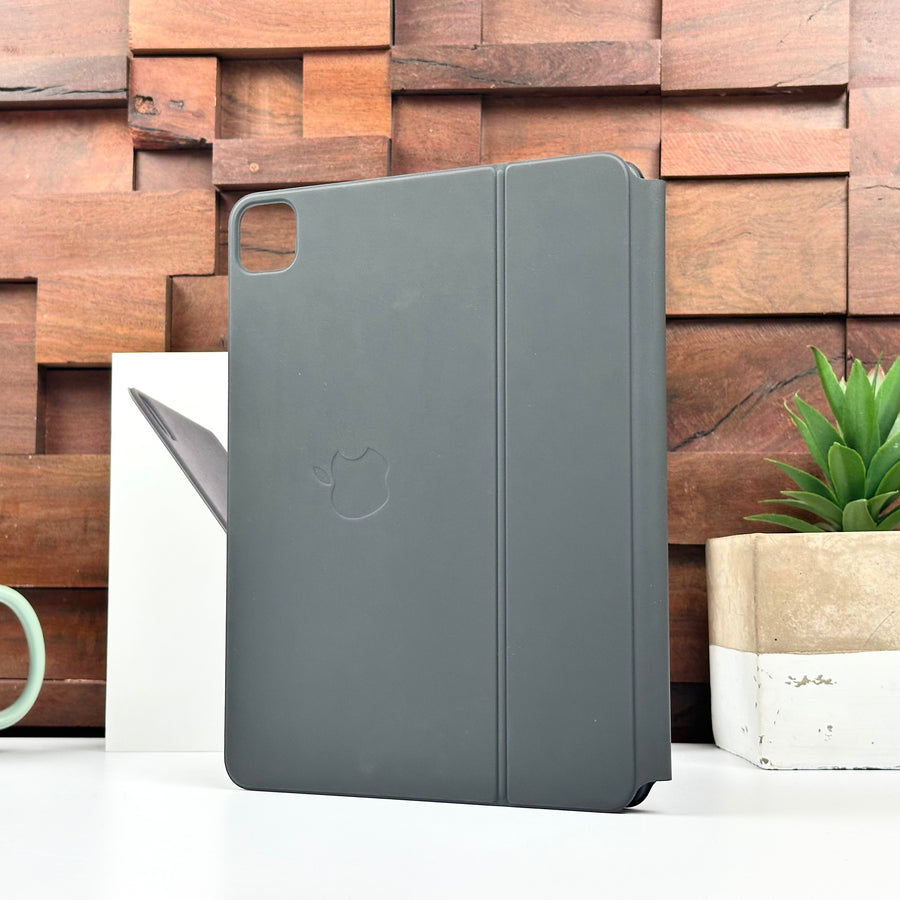 Pre-owned black Apple Magic Keyboard for iPad Pro 11-inch and iPad Air, closed, showing the outer cover