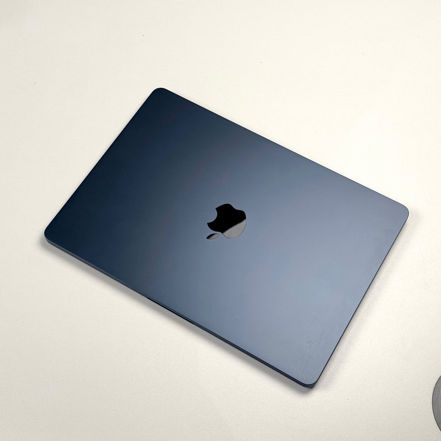 Closed pre-owned MacBook Air 13-inch M2 8GB 256GB in Midnight, showing lid condition - Mac Shack
