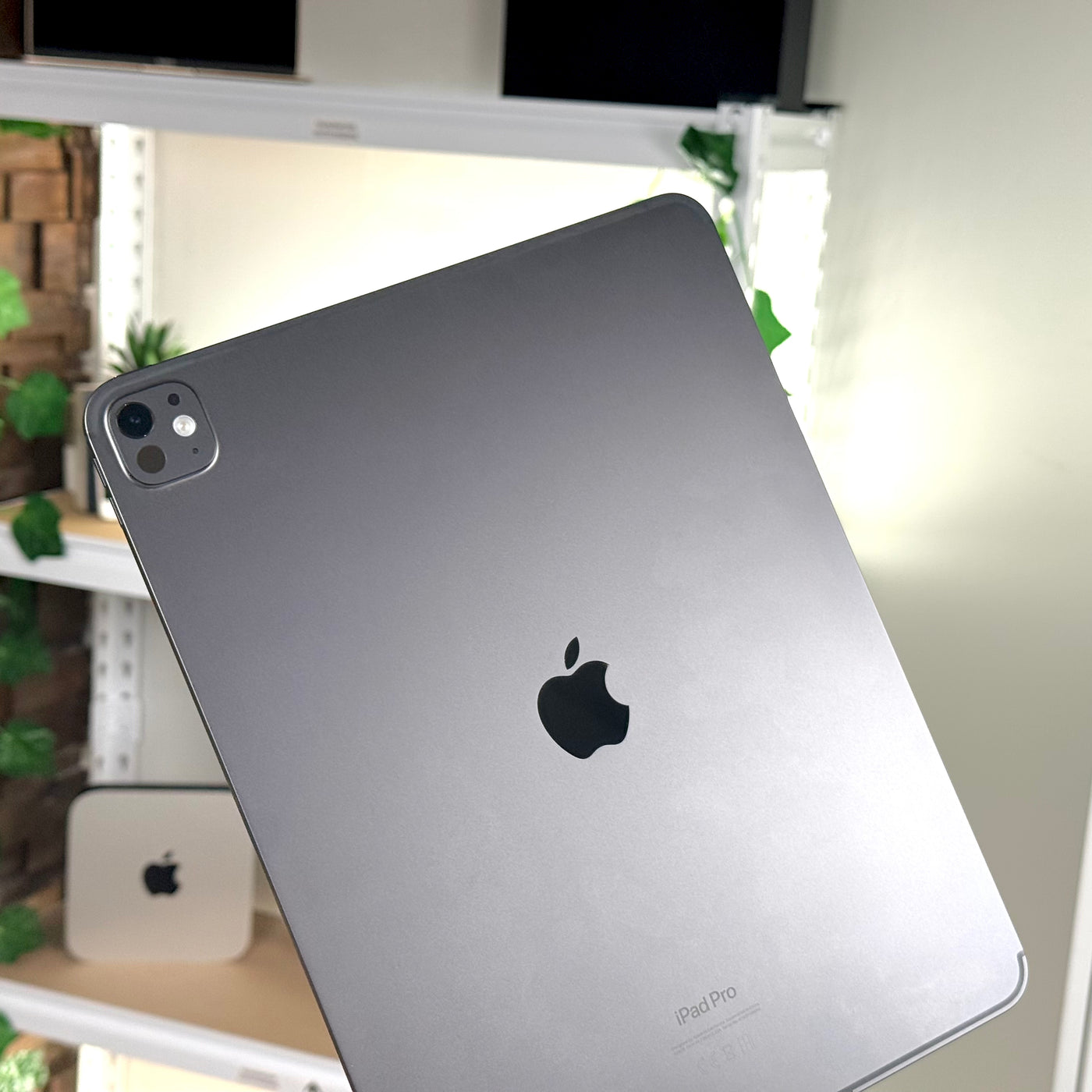 Back of a pre-owned iPad Pro 13-inch M4 Space Black showing the camera and Apple logo - Mac Shack