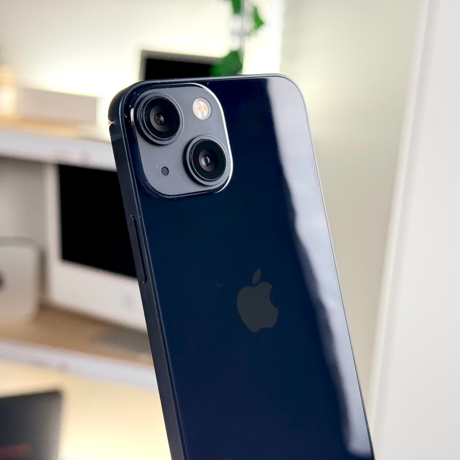 Back of pre-owned iPhone 13 mini Midnight showing dual 12MP camera and Apple logo - Mac Shack