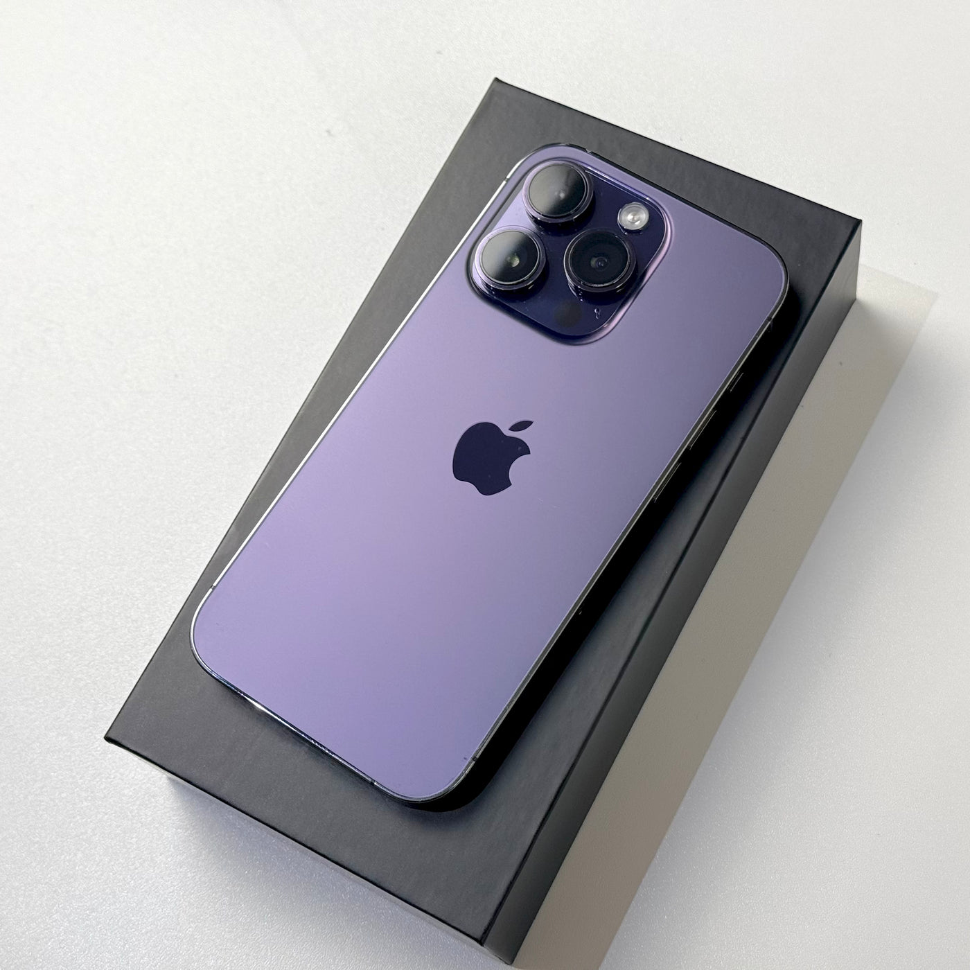 Back of a pre-owned iPhone 14 Pro in Deep Purple showing the camera system - Mac Shack