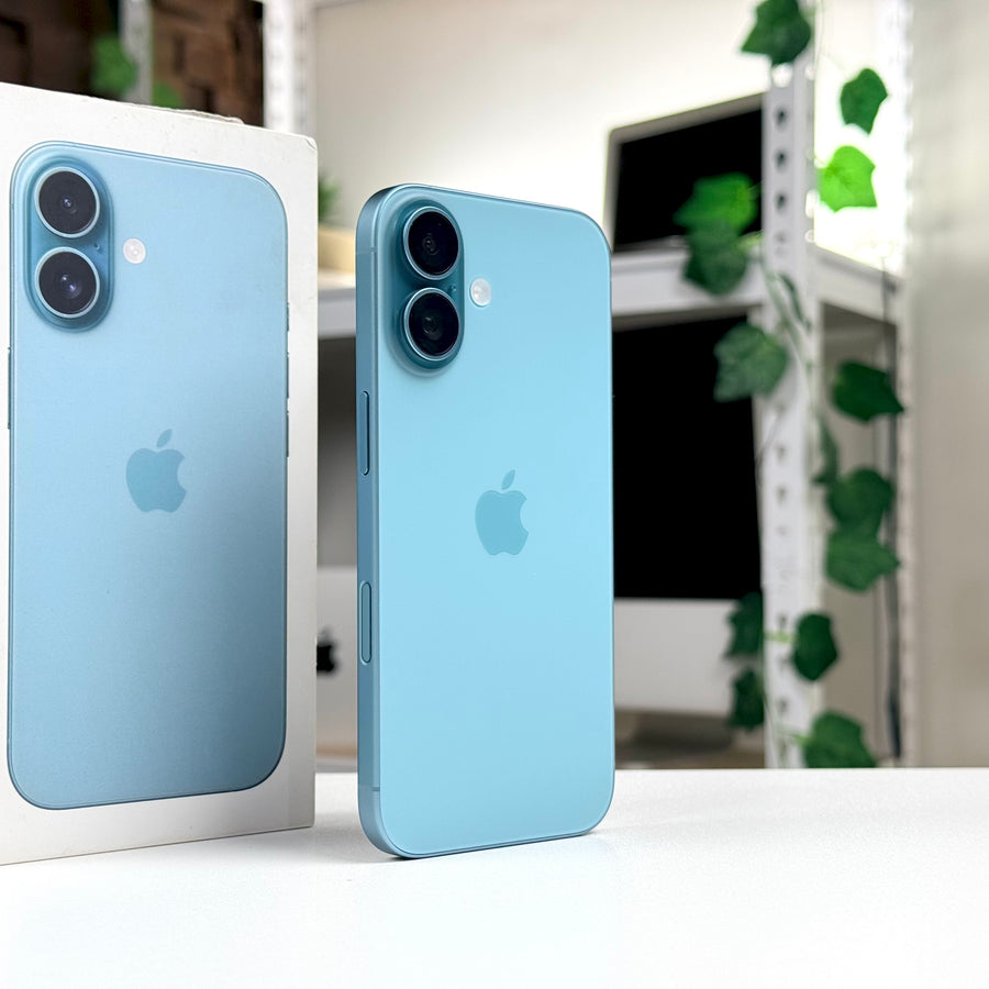 Pre-owned iPhone 16 Teal back view standing beside original box - MacShack