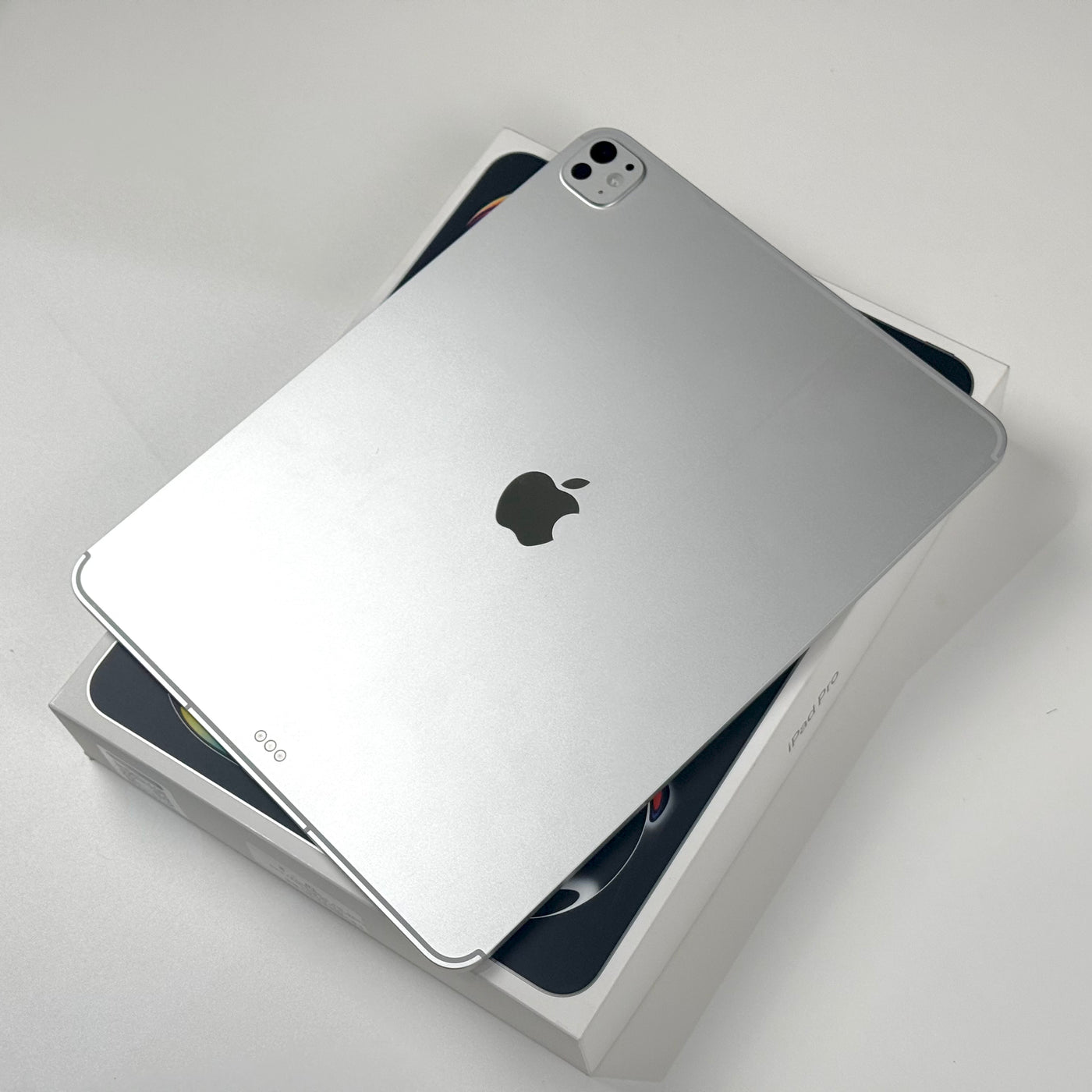 Back of a pre-owned iPad Pro 13-inch M5 in Silver, angled view - Mac Shack