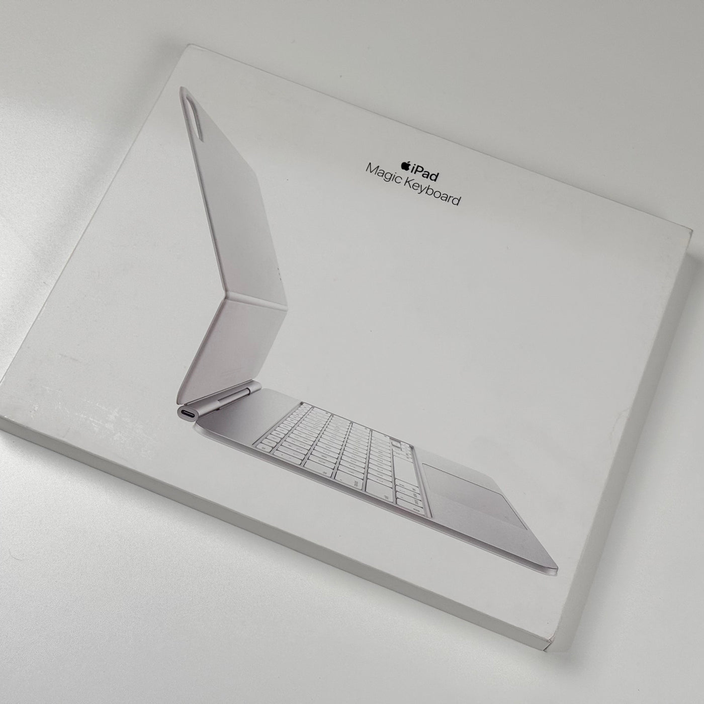 Close-up of the hinge on a pre-owned Apple Magic Keyboard for iPad Pro 13-inch, White - Mac Shack
