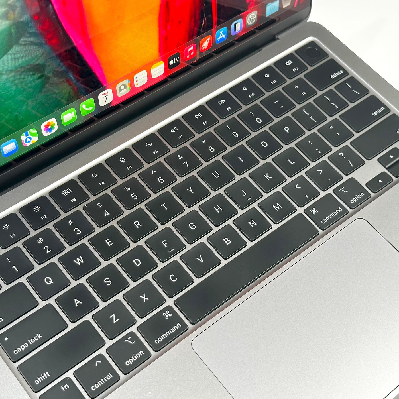 Close-up of the backlit keyboard and trackpad on the pre-owned MacBook Air M2 - Mac Shack