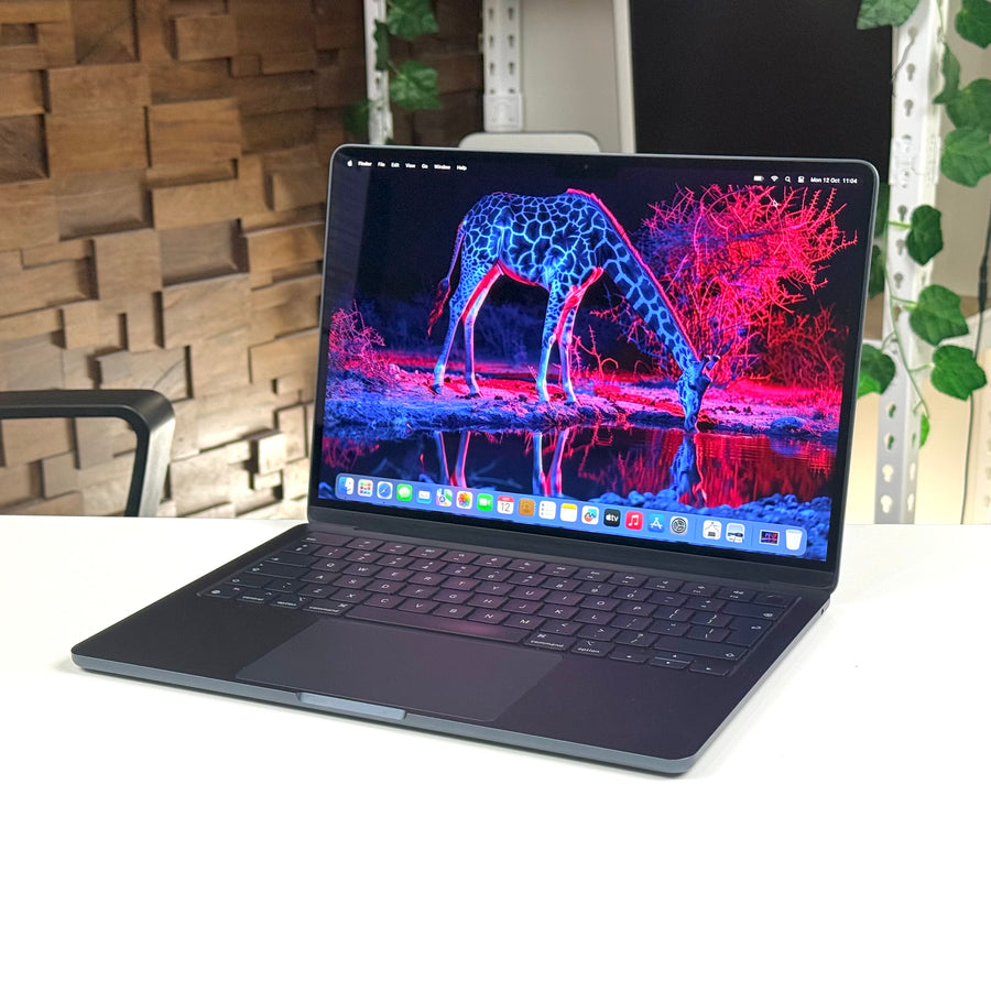 Pre-owned MacBook Air 13-inch M2 Midnight, open, side angle view - Mac Shack
