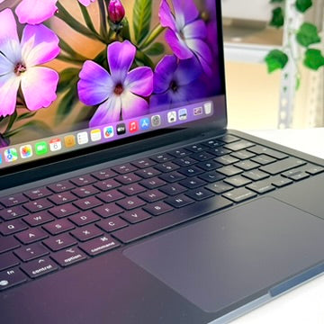Keyboard and display of a pre-owned MacBook Air 13-inch M3 in Midnight - Mac Shack