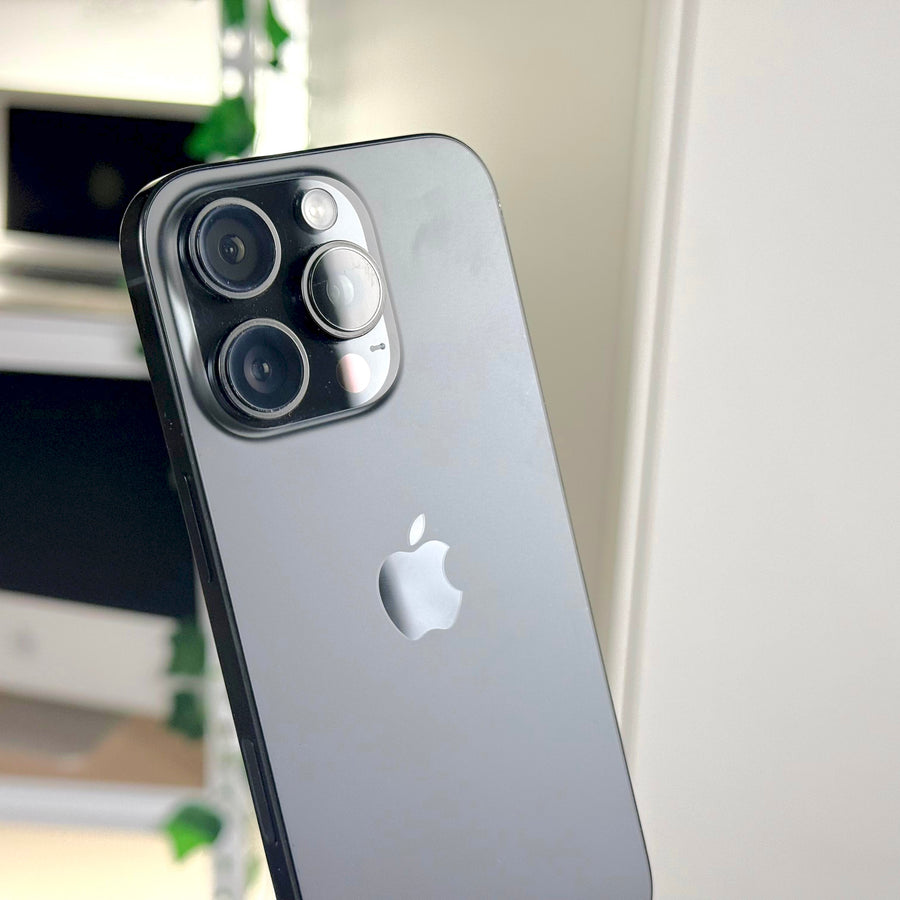 Black Titanium iPhone 16 Pro rear triple camera close-up