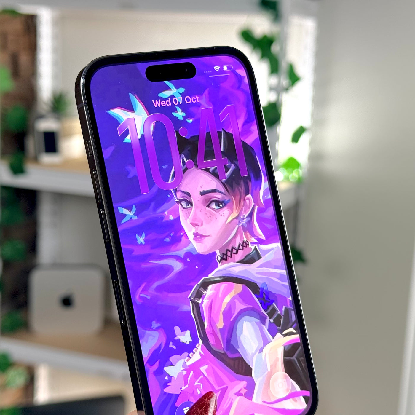 Pre-owned iPhone 14 Pro Deep Purple, front angle view of the display - Mac Shack
