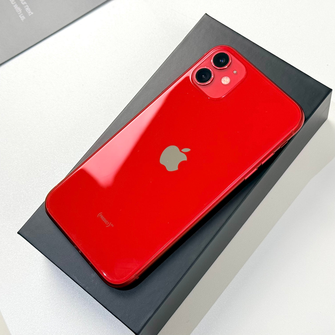 Back of pre-owned iPhone 11 Red in box showing dual camera - Mac Shack