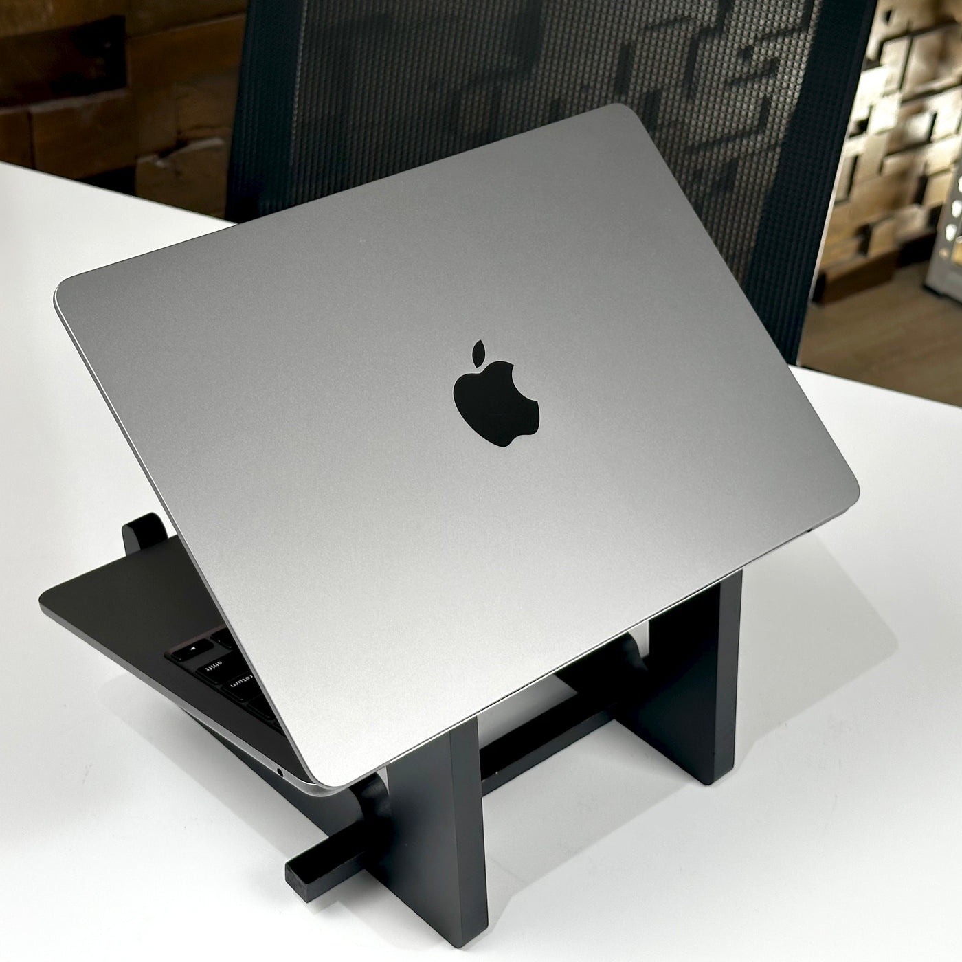 Back of the lid of the pre-owned MacBook Air M2 in Space Gray, showing the Apple logo - Mac Shack