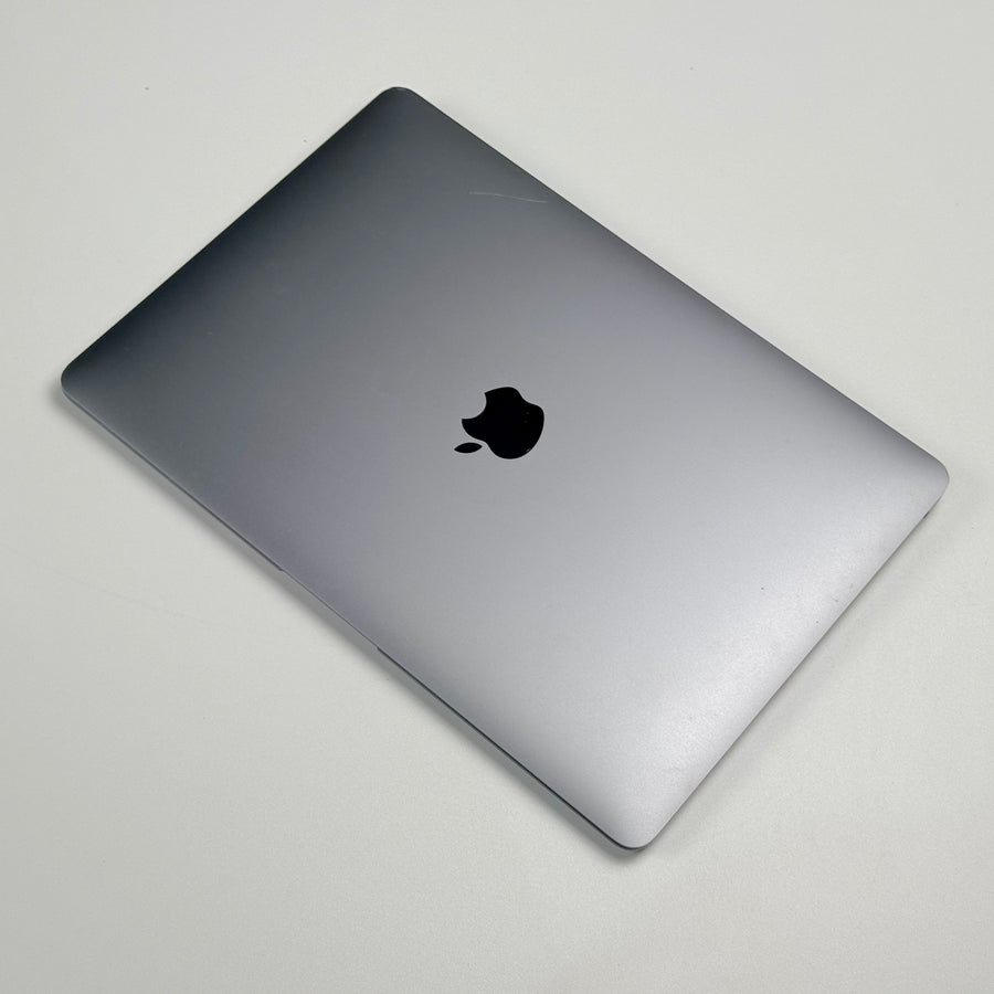 Top view of the closed pre-owned MacBook Air M1 in Space Gray, showing light wear on the lid - Mac Shack
