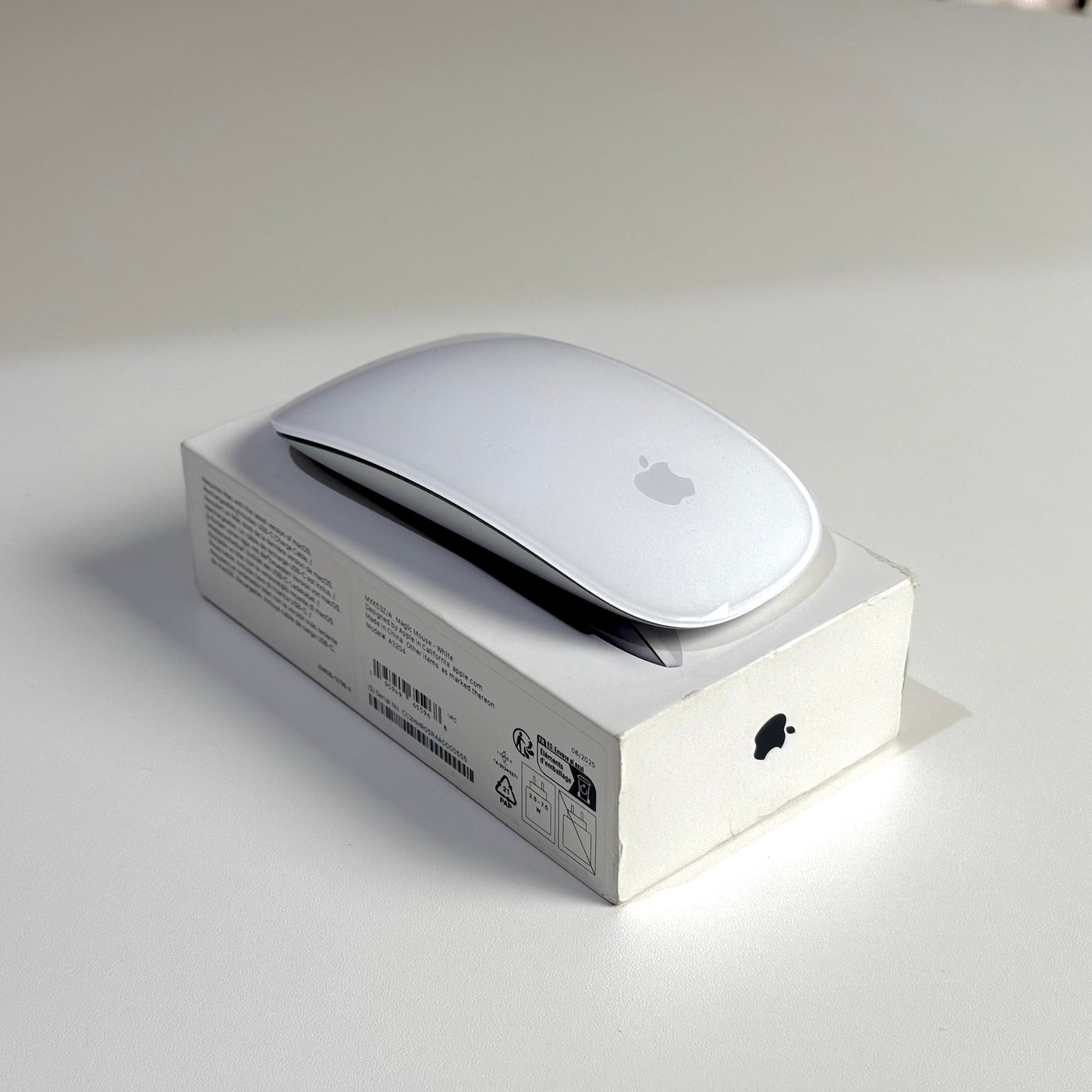 Pre-owned Apple Magic Mouse (USB-C) White, angled top view - Mac Shack