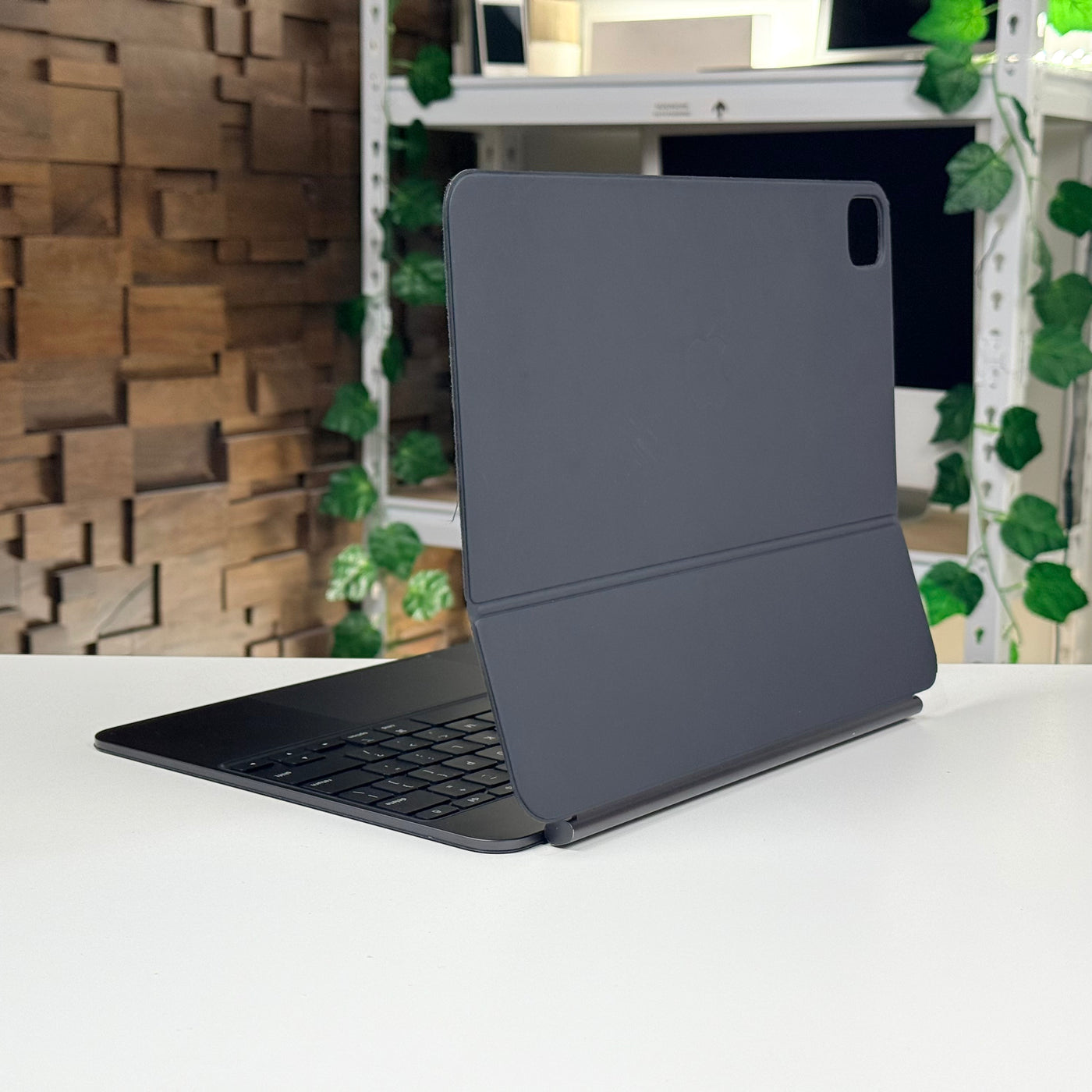 Rear angle of the pre-owned black Apple Magic Keyboard for iPad Pro 13-inch, open – actual unit