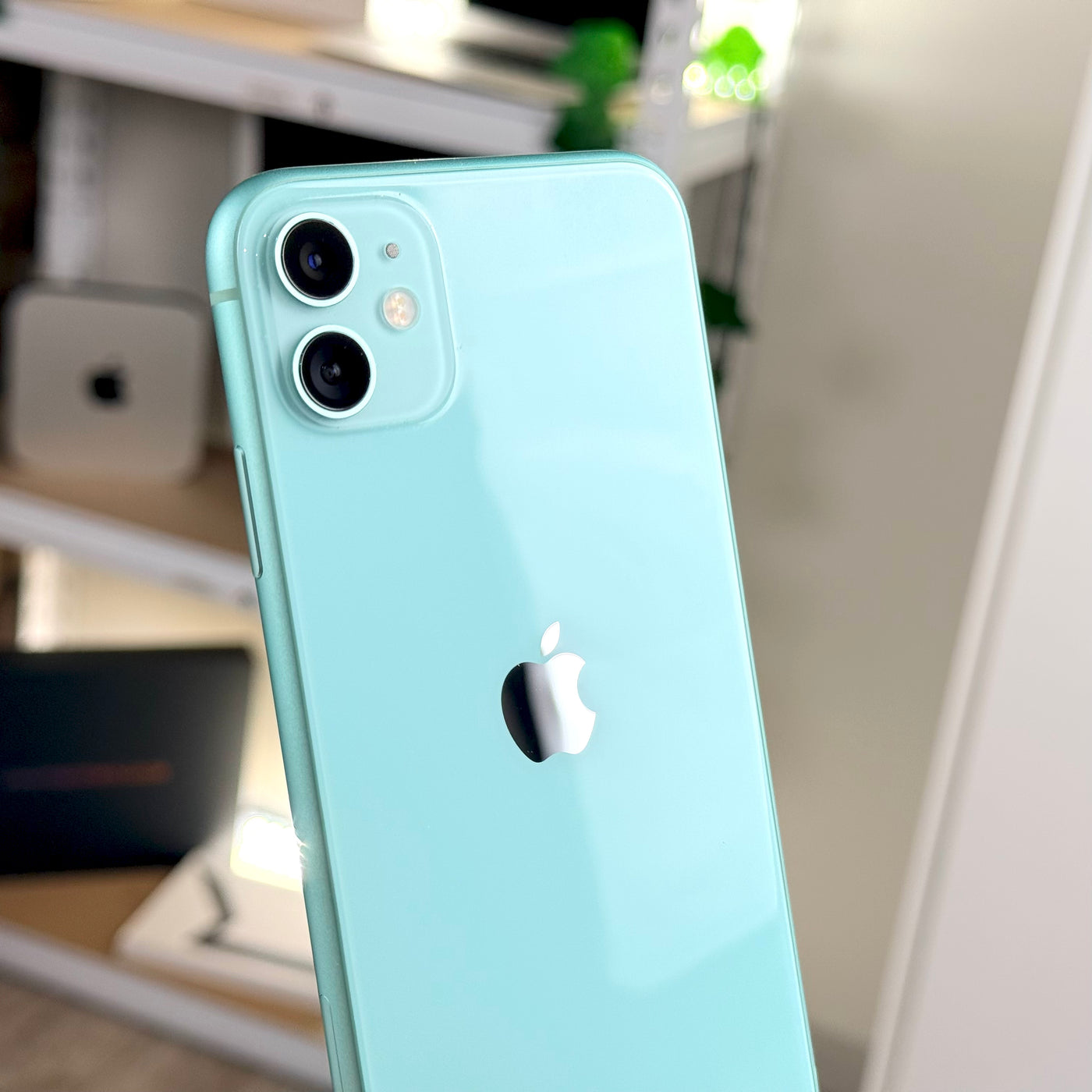 Back of pre-owned iPhone 11 Green showing dual 12MP camera and Apple logo - Mac Shack