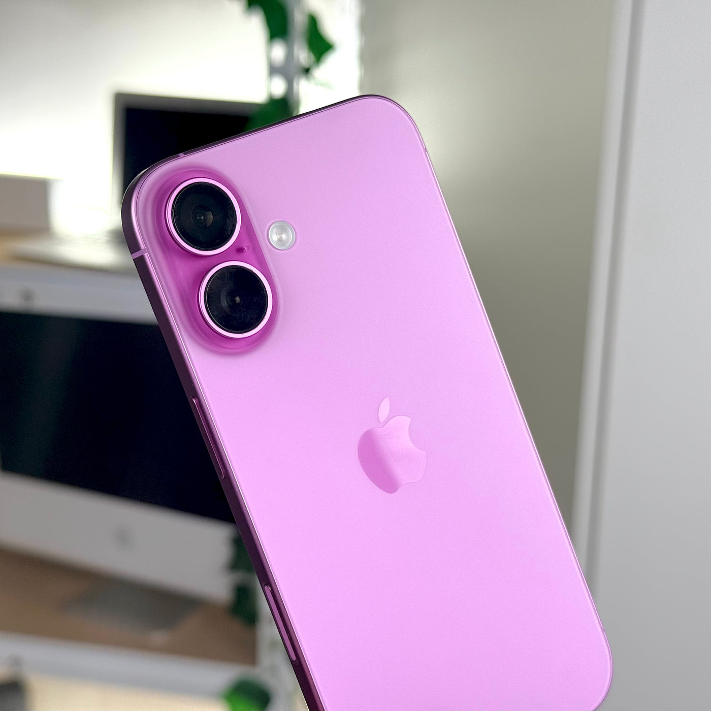 Pre-owned iPhone 16 Pink, back angle view showing the cameras - Mac Shack