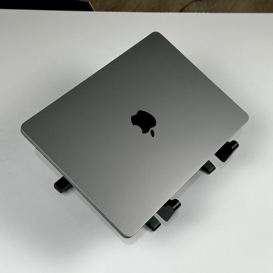 Top view of the closed pre-owned MacBook Air M2 in Space Gray - Mac Shack