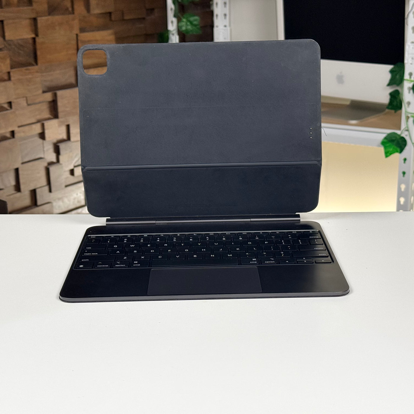 Front view of the pre-owned black Apple Magic Keyboard for iPad Pro 13-inch with keyboard and trackpad – actual unit